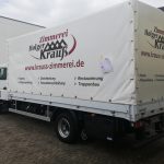 Werbung auf LKW für Zimmerei
